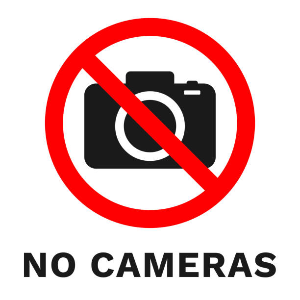 NO CAMERAS sign. Sticker with inscription. Vector NO CAMERAS sign. Sticker with inscription. Vector. no photographs sign stock illustrations