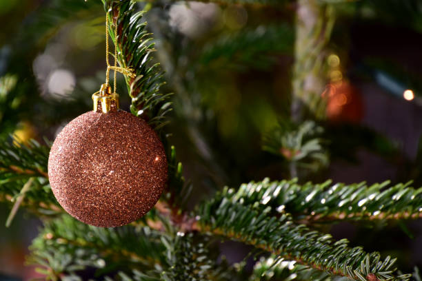 istock golden christmas balls on tree with bokeh effects 1079524216