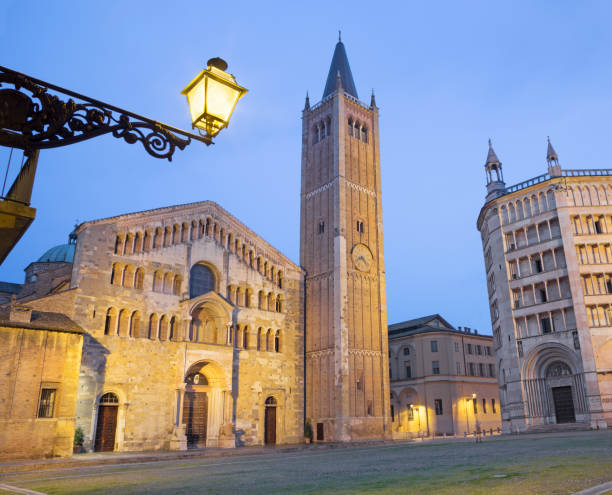 istock Parma - The Dome - Duomo (La cattedrale di Santa Maria Assunta) and Baptistery at dusk. 1079527292