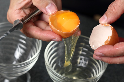 Separating egg yolk from white. Making Cider Pie Series.