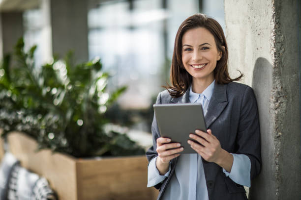 istock Beautiful businesswoman using digital tablet in the office. 1079547182