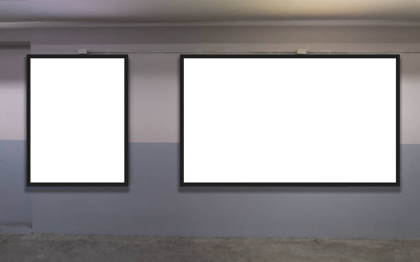 istock indoor car parking and empty white billboard .Blank space for text and images 1079557240