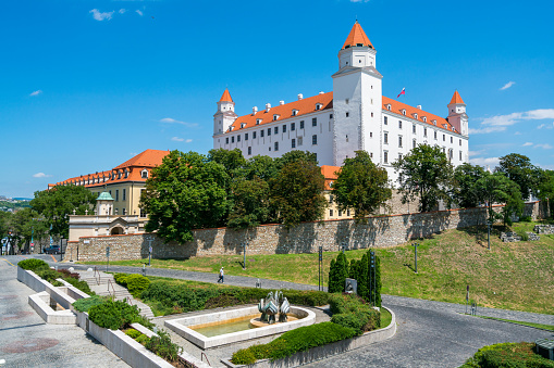 Bratislava, Slovakia - July 5, 2016: view showing Bratislava Castle , fountain, trees can be seen on the background