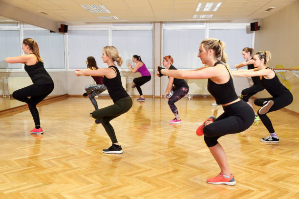 istock Group of women exercising in a gym 1079574272