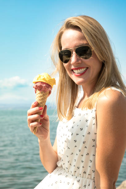 istock young beautiful woman on the water 1079577122