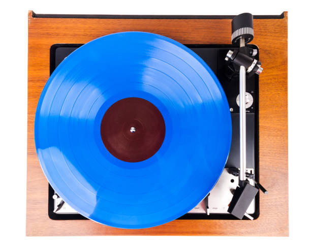 istock Vintage turntable with a blue vinyl isolated on white 1079577900