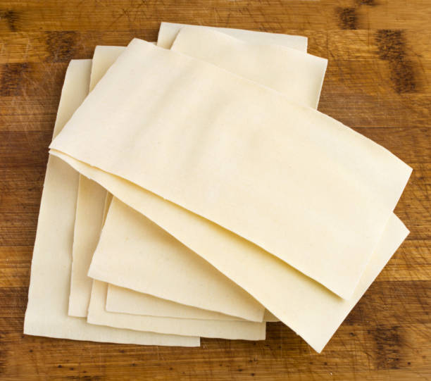 istock Heap of Uncooked Lasagna Sheets or Dry Italian Pasta 1079582476