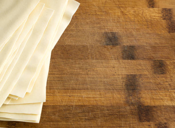 istock Heap of Uncooked Lasagna Sheets or Dry Italian Pasta 1079582496