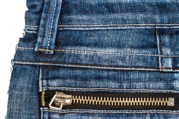 istock Piece of blue jeans fabric with a zipper 1079587598