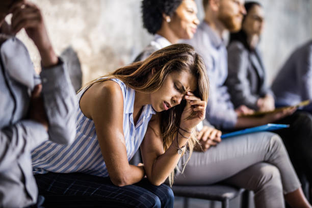 istock Young businesswoman having a headache while waiting for job interview. 1079591888
