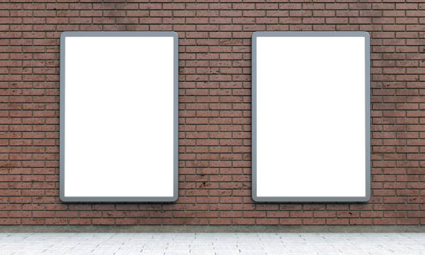 istock Blank lightboxes or street LCD panels on brown brick wall 1079607322