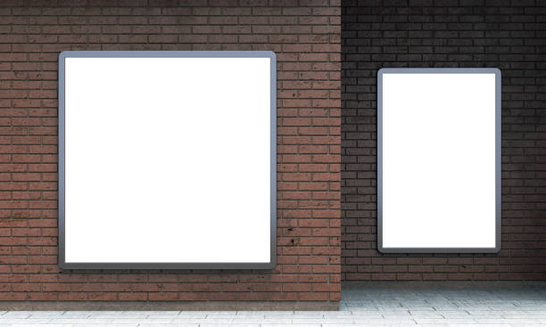 istock Blank lightboxes or street LCD panels on brown brick wall 1079607704