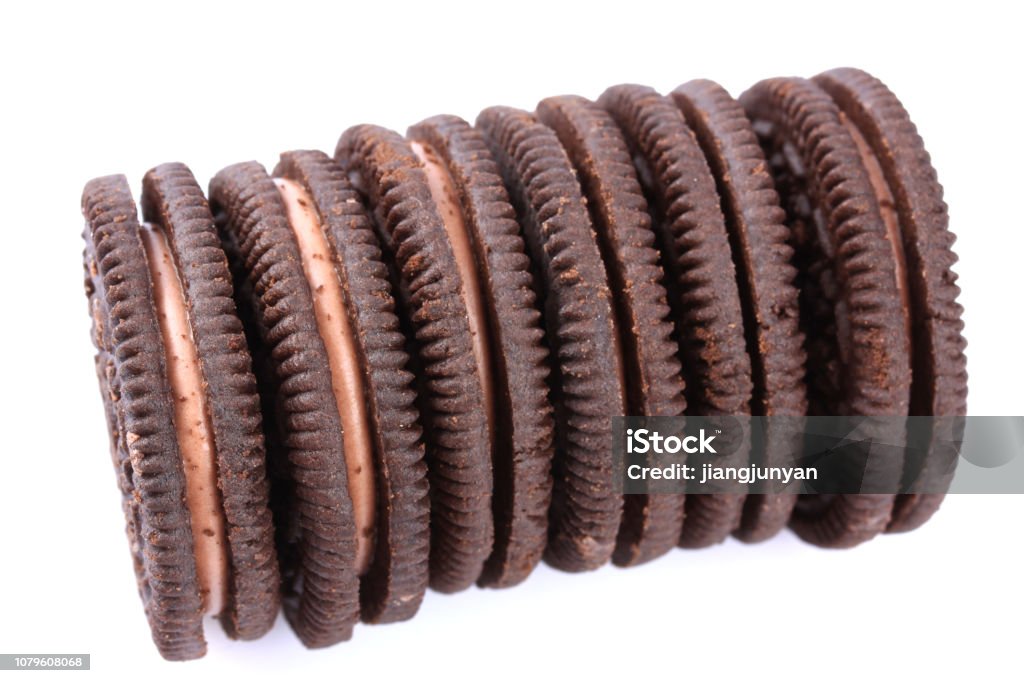 Chocolate cookies with creme filing isolated on white - China - East Asia Stock Photo