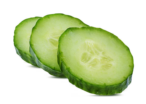 istock Sliced cucumber isolated on white background with clipping path 1079615580