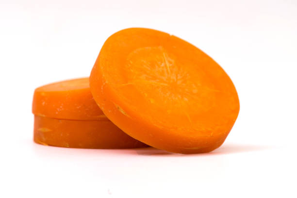 istock carrot slice isolated on white background 1079621222