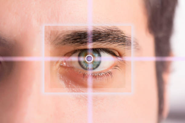 istock Handsome man pointing to eye 1079627020