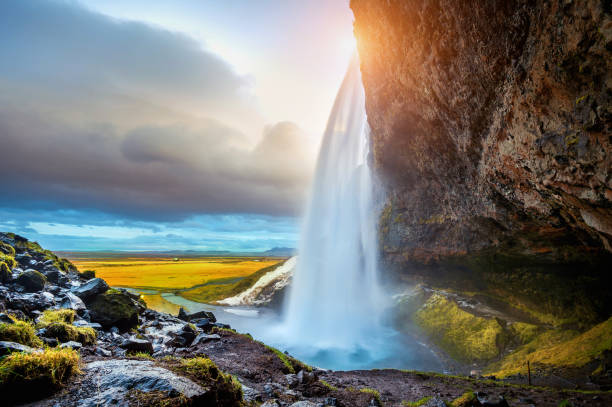 istock Seljalandsfoss waterfall during the sunset, Beautiful waterfall in Iceland. 1079635954