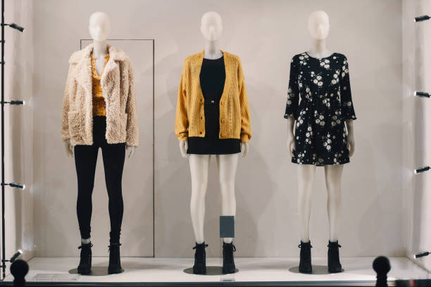 women clothing on mannequins in a store in paris, 2018. - mannequin imagens e fotografias de stock