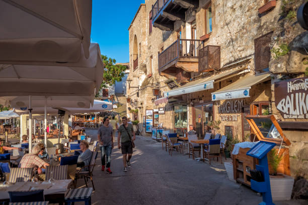 Busy street at Old Town of Kyrenia KYRENIA, CYPRUS - MAY 11, 2018: Busy street at Old Town of Kyrenia. kyrenia photos stock pictures, royalty-free photos & images