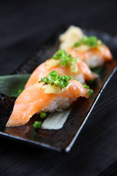 istock Lightly Broiled Salmon Cheese Sushi 1079654248