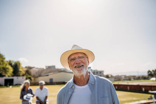 istock Close up of a senior man standing in a park 1079659380