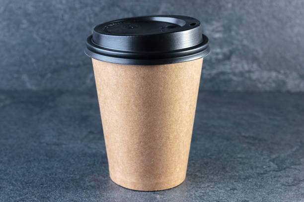 istock Blank take away kraft coffee cup isolated on white 1079660164