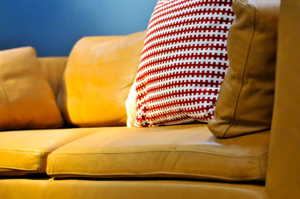 istock Colorful cushions on couch in home 1079660270