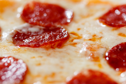 fresh italian classic original pepperoni pizza macro close up background