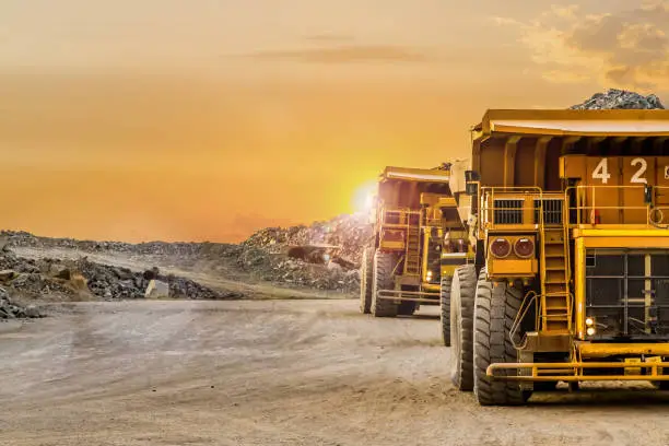 Photo of Dump Trucks transporting Platinum ore for processing