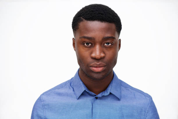 istock Close up handsome young black man against isolated white background 1079671168