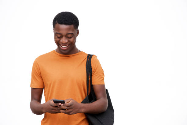istock happy young man looking at mobile phone against isolated white background 1079671284