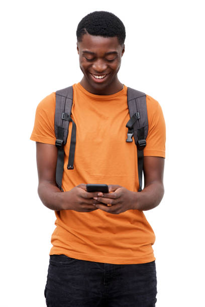 istock cool young black guy against isolated white background looking at cellphone 1079671322