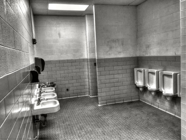 urinals in an old building for men only