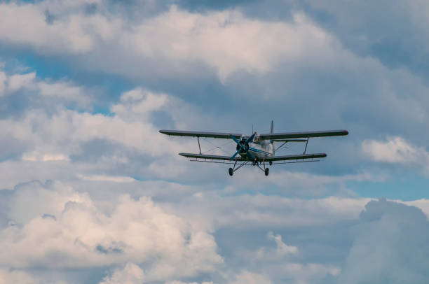 istock Retro biplane in dramatic skies. Antonov AN-2 plane. 1079672826