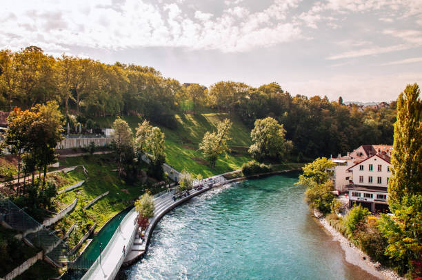 turquoise Aare river shot from Untertorbrucke bridge Old town Bern - Switzerland