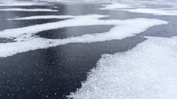 istock Frost crystals on surface of river ice. Cold winter background 1079698676