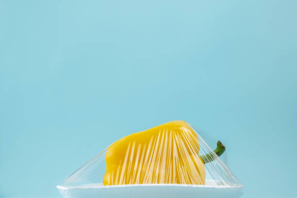 istock Food in plastic wrap at blue background 1079722692