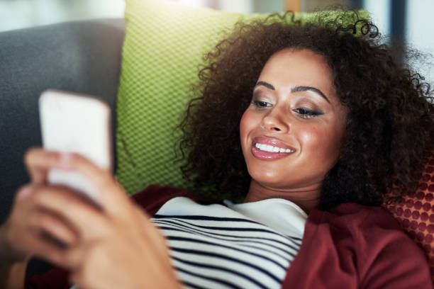 istock Kicking back with her social network for company 1079725548