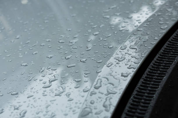istock rain drops on car with glass coating protection skin 1079725612