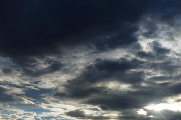 istock monsoon weather dramatic moody rain storm sky with light in the darkness cloudy 1079725858