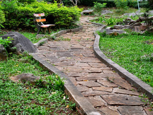 istock Limestone tile walkway in garden 1079729690