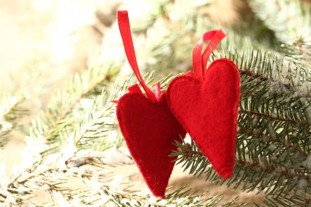 istock two red heart  christmas valentine love background 1079730944