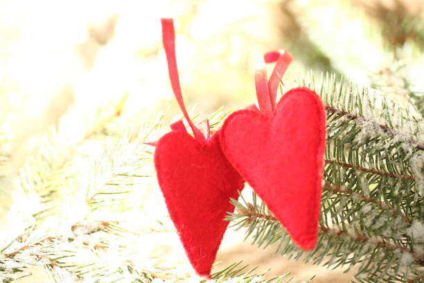 istock two red heart  christmas valentine love background 1079730952