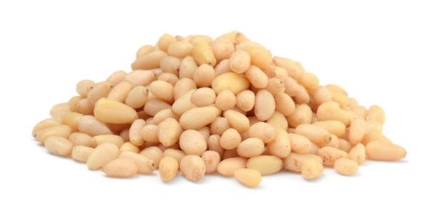 istock Pile of pine nuts isolated on white 1079738052