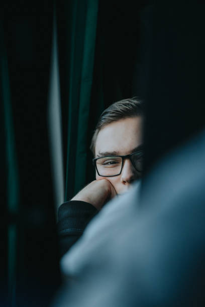 istock Portrait Of Young Man In Train 1079738360