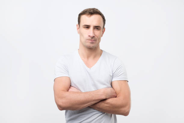 istock Sad italian guy in white t-shirt thoughtfully looking aside 1079744236