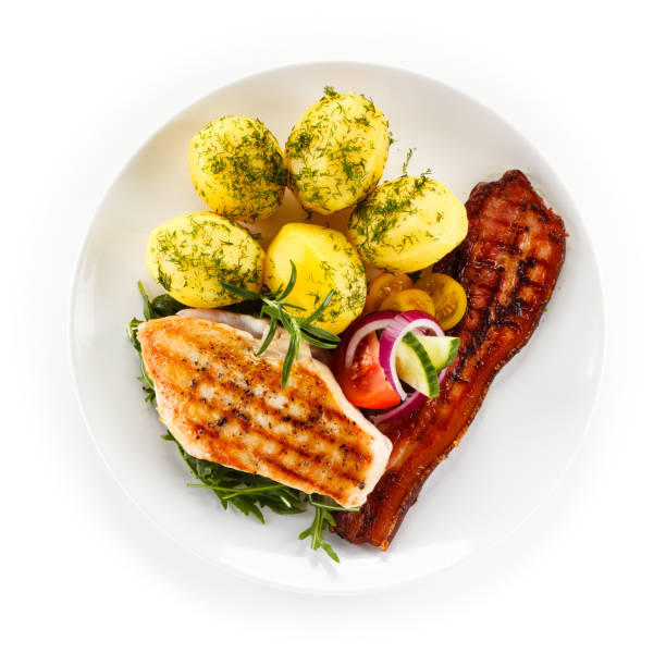 istock Grilled chicken breast, bacon, boiled potatoes and vegetables 1079749972