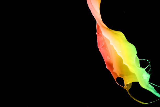 istock Colored paint splashes isolated on black background 1079764296
