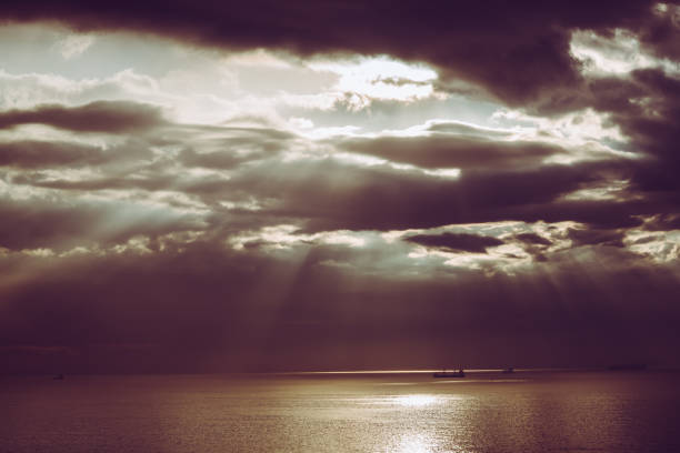 Dramatic sky with massive rain clouds on the scenic sunset in Hikkaduwa, Sri Lanka, in the winter season.