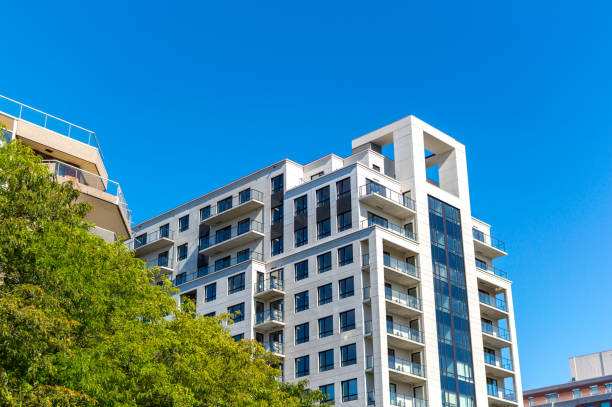 istock Modern condo buildings with huge windows 1079764430